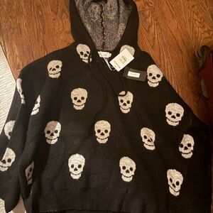Miracle Black Hoodie with White Skull Design